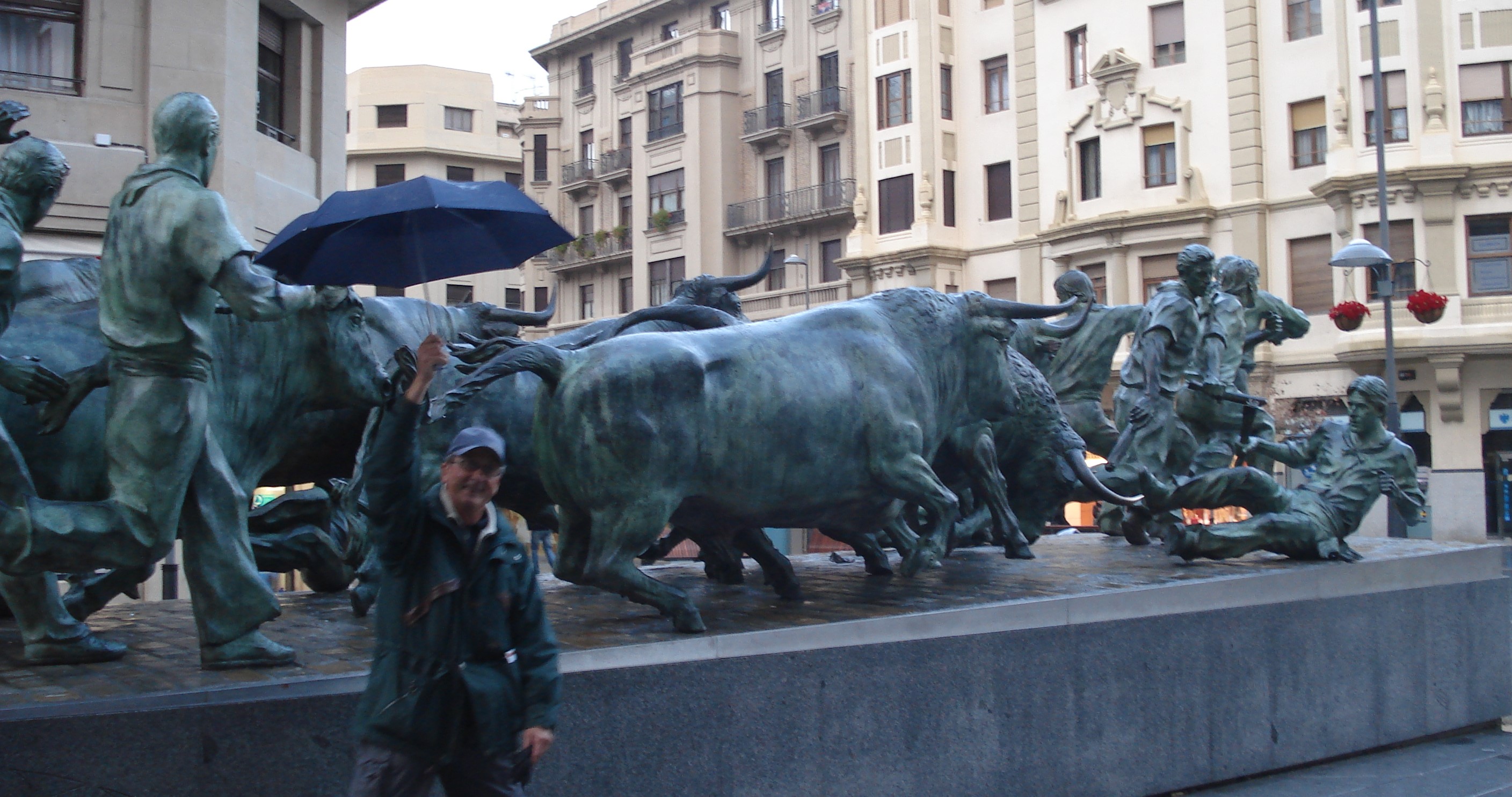 Pamplona bull with umbrella